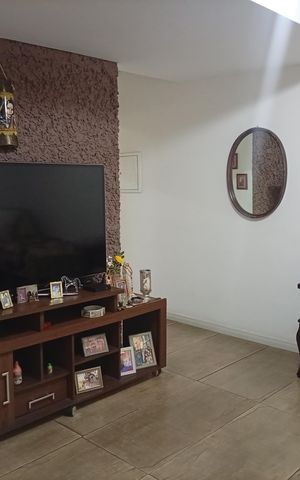 Casa à venda com 129m², 4 quartos e 2 vagasSala