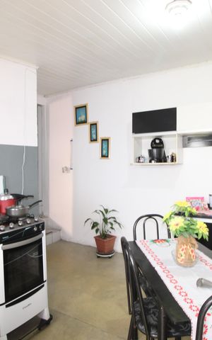 Casa à venda com 96m², 3 quartos e 2 vagasSala/Cozinha