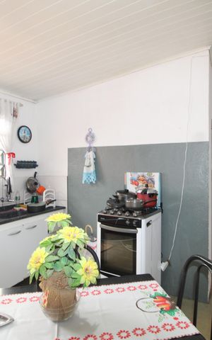 Casa à venda com 96m², 3 quartos e 2 vagasSala/Cozinha