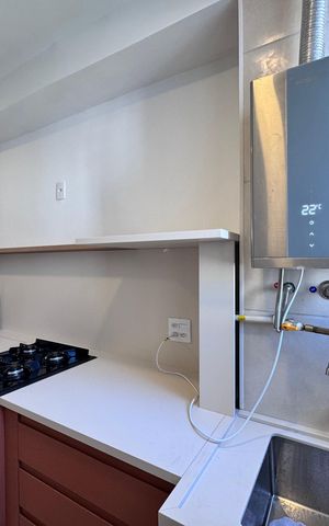 Apartamento para alugar com 49m², 2 quartos e 1 vaga Apartamento para alugar com 49m², 2 quartos e 1 vagaCozinha e Área de Serviço