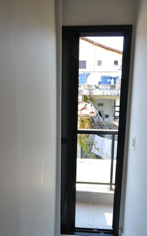 Casa de condomínio para alugar com 63m², 2 quartos e 2 vagasSuíte 1
