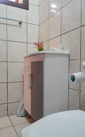 Casa à venda com 210m², 3 quartos e 4 vagasBanheiro da Suíte 2