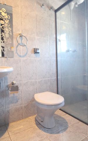Casa para alugar com 409m², 4 quartos e 5 vagasBanheiro da suíte 3