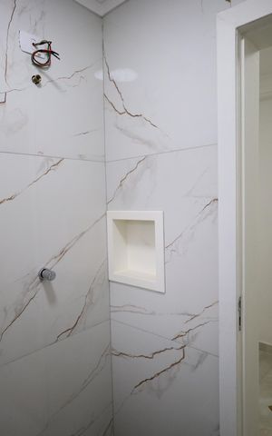 Casa à venda com 150m², 3 quartos e 2 vagasBanheiro da Suíte 1