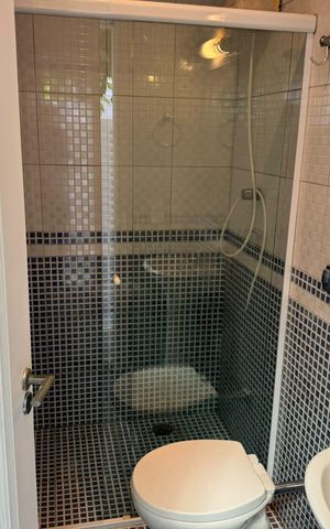 Casa de condomínio à venda com 410m², 4 quartos e 4 vagasBanheiro