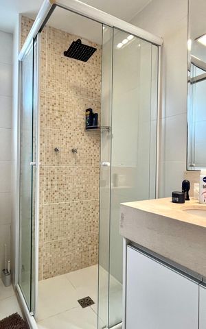 Apartamento à venda com 77m², 2 quartos e 2 vagas Apartamento à venda com 77m², 2 quartos e 2 vagasBanheiro da Suíte 1