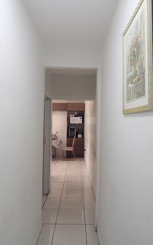 Casa à venda com 130m², 2 quartos e 2 vagasCorredor