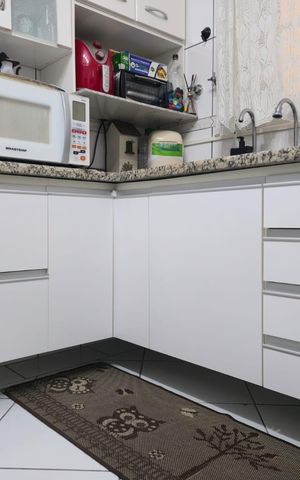 Casa à venda com 200m², 2 quartos e 2 vagas Casa à venda com 200m², 2 quartos e 2 vagasCozinha
