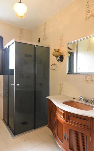Casa à venda com 418m², 5 quartos e 4 vagasBanheiro da Suíte 3