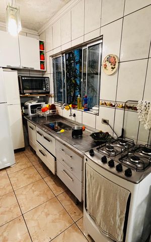 Casa à venda com 120m², 4 quartos e 1 vaga Casa à venda com 120m², 4 quartos e 1 vagaCozinha
