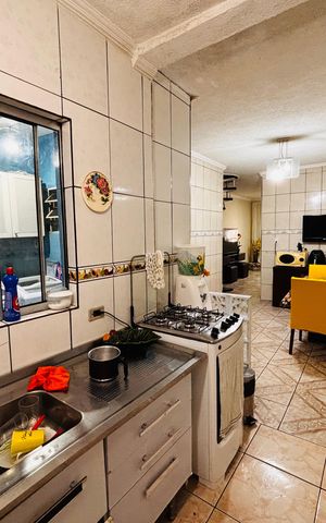 Casa à venda com 120m², 4 quartos e 1 vaga Casa à venda com 120m², 4 quartos e 1 vagaCozinha