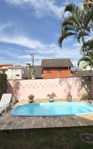 Casa à venda com 257m², 3 quartos e 3 vagas Casa à venda com 257m², 3 quartos e 3 vagasVista - Varanda