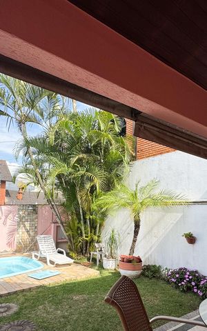 Casa à venda com 257m², 3 quartos e 3 vagas Casa à venda com 257m², 3 quartos e 3 vagasVista - Sala
