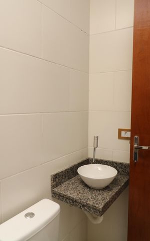 Casa à venda com 79m², 3 quartos e 2 vagasBanheiro da Suíte 2
