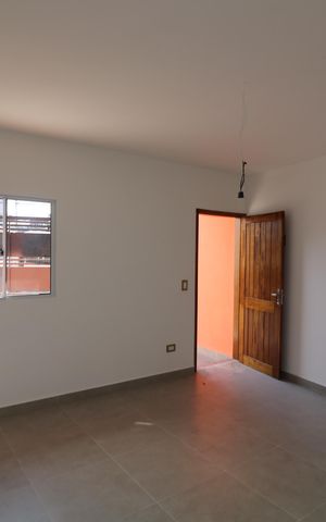 Casa à venda com 79m², 3 quartos e 2 vagasSala
