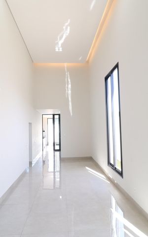 Casa de condomínio para alugar com 210m², 3 quartos e 4 vagasSala