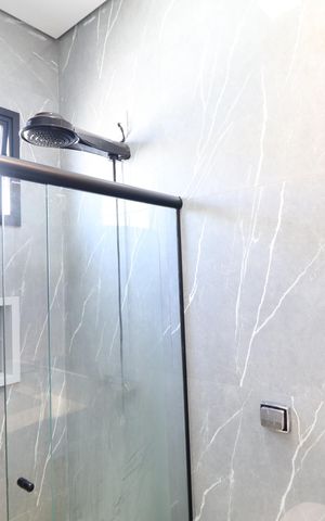 Casa de condomínio para alugar com 210m², 3 quartos e 4 vagasBanheiro do Quarto 2