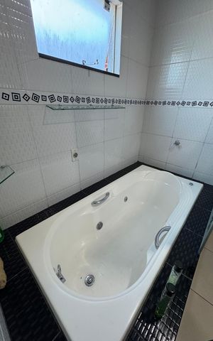 Casa à venda com 400m², 3 quartos e 2 vagas Casa à venda com 400m², 3 quartos e 2 vagasBanheiro da Suíte
