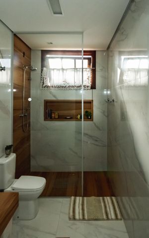 Casa à venda com 330m², 4 quartos e 4 vagasBanheiro Social