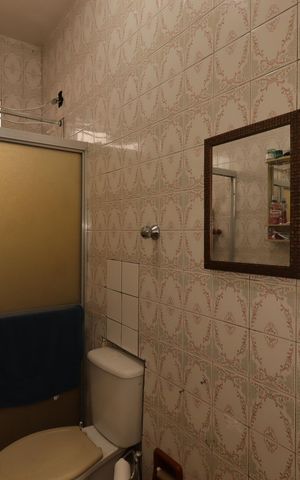 Casa à venda com 138m², 3 quartos e 3 vagasBanheiro social
