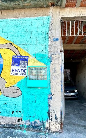 Casa à venda com 161m², 3 quartos e 2 vagasPlaca instalada na fachada do imóvel 