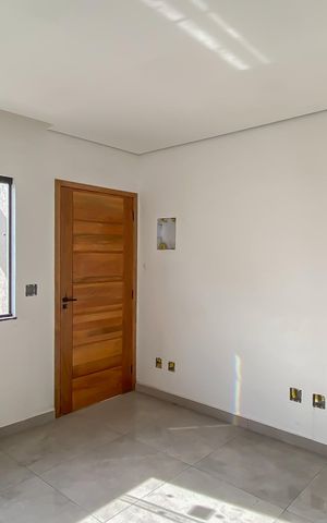 Casa à venda com 65m², 2 quartos e 2 vagas Casa à venda com 65m², 2 quartos e 2 vagasSala