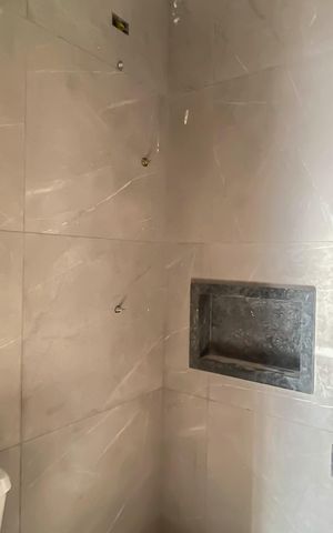 Casa à venda com 65m², 2 quartos e 2 vagas Casa à venda com 65m², 2 quartos e 2 vagasBanheiro da