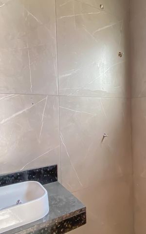 Casa à venda com 65m², 2 quartos e 2 vagas Casa à venda com 65m², 2 quartos e 2 vagasBanheiro da Suíte 1