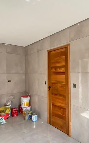 Casa à venda com 65m², 2 quartos e 2 vagas Casa à venda com 65m², 2 quartos e 2 vagasCozinha