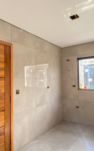 Casa à venda com 65m², 2 quartos e 2 vagas Casa à venda com 65m², 2 quartos e 2 vagasCozinha