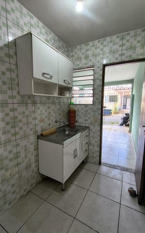 Casa à venda com 100m², 2 quartos e 1 vaga Casa à venda com 100m², 2 quartos e 1 vagaCozinha