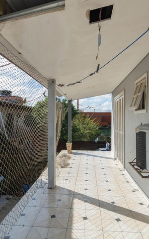 Casa à venda com 150m², 4 quartos e 2 vagas Casa à venda com 150m², 4 quartos e 2 vagasVaranda da Sala