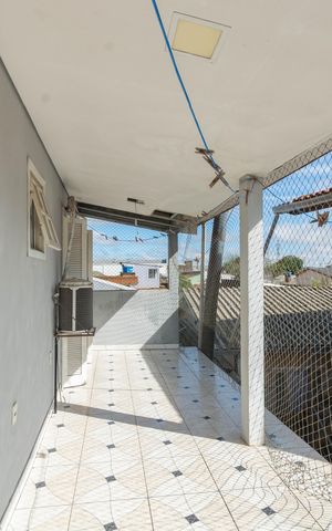 Casa à venda com 150m², 4 quartos e 2 vagas Casa à venda com 150m², 4 quartos e 2 vagasVaranda da Sala