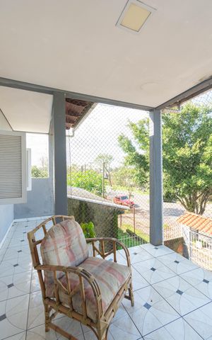 Casa à venda com 150m², 4 quartos e 2 vagas Casa à venda com 150m², 4 quartos e 2 vagasVaranda da Sala