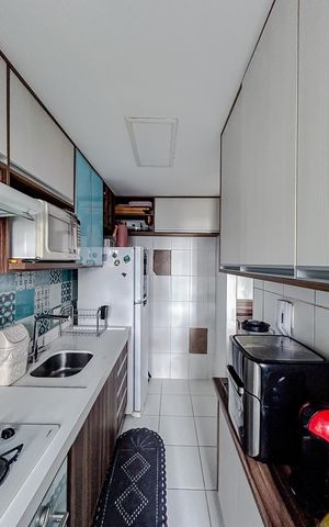 Apartamento à venda com 54m², 2 quartos e 1 vagaCozinha e Área de Serviço