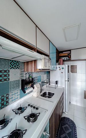 Apartamento à venda com 54m², 2 quartos e 1 vagaCozinha e Área de Serviço