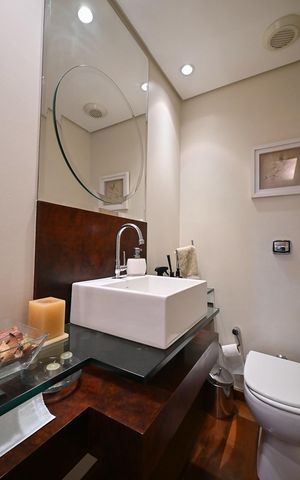Casa de condomínio à venda com 310m², 4 quartos e 4 vagasLavabo