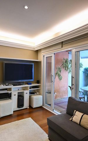 Casa de condomínio à venda com 310m², 4 quartos e 4 vagasSala de Tv