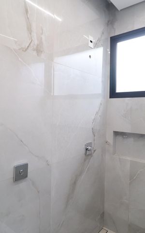 Casa de condomínio para alugar com 300m², 4 quartos e 4 vagasBanheiro da Suíte 2