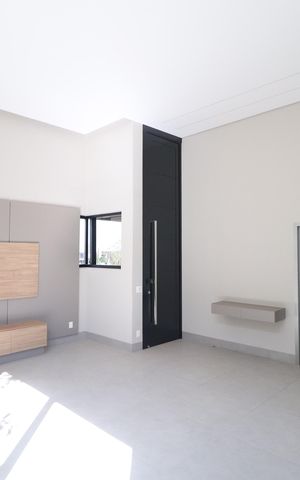 Casa de condomínio para alugar com 300m², 4 quartos e 4 vagasSala