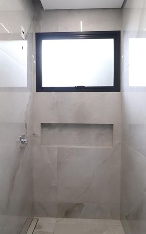 Casa de condomínio para alugar com 300m², 4 quartos e 4 vagasBanheiro da Suíte 2