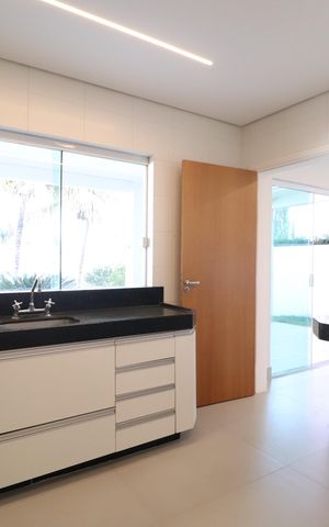 Casa de condomínio para alugar com 259m², 4 quartos e 4 vagasCozinha