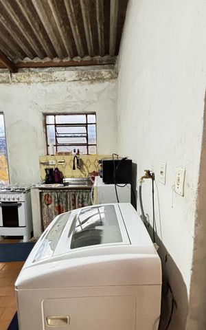 Casa à venda com 150m², 2 quartos e 3 vagas Casa à venda com 150m², 2 quartos e 3 vagasCozinha