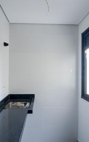 Apartamento à venda com 45m², 2 quartos e 1 vaga Apartamento à venda com 45m², 2 quartos e 1 vagaSala/Cozinha e Área de Serviço