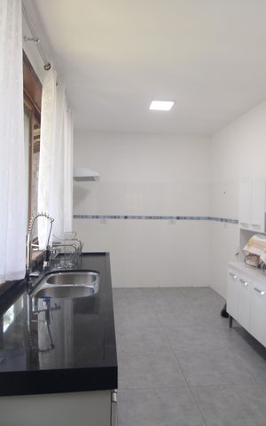 Casa de condomínio à venda com 173m², 2 quartos e 2 vagasCozinha 1