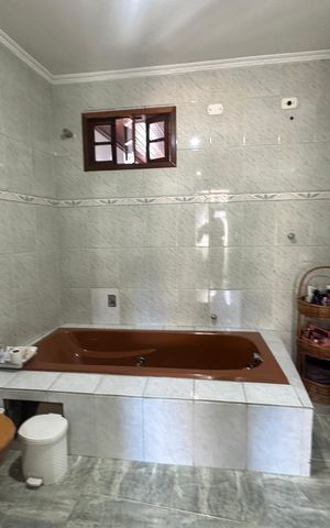Casa à venda com 233m², 4 quartos e 2 vagas Casa à venda com 233m², 4 quartos e 2 vagasBanheiro da Suíte