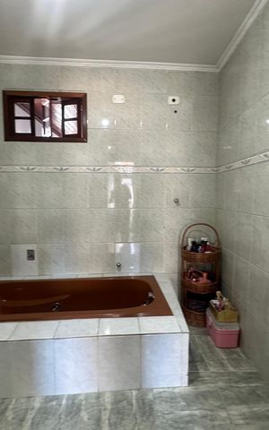 Casa à venda com 233m², 4 quartos e 2 vagas Casa à venda com 233m², 4 quartos e 2 vagasBanheiro da Suíte