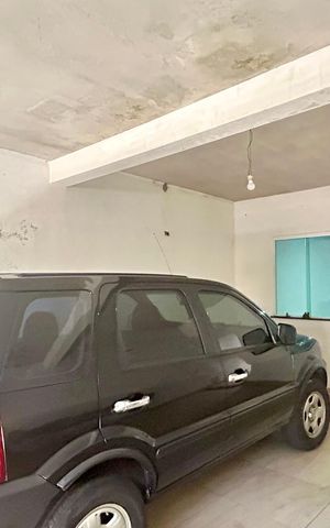 Casa à venda com 250m², 4 quartos e 2 vagas Casa à venda com 250m², 4 quartos e 2 vagasGaragem