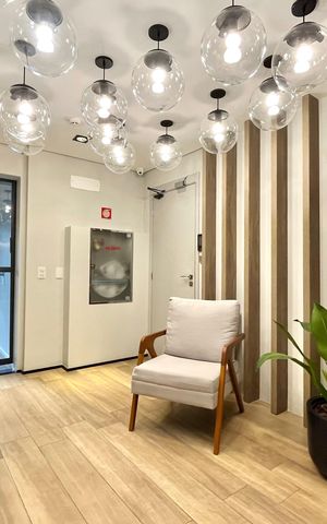 Studio à venda com 26m², 1 quarto e sem vaga Studio à venda com 26m², 1 quarto e sem vagaHall social