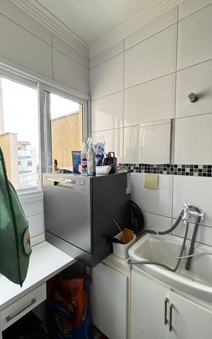 Apartamento à venda com 56m², 2 quartos e 1 vaga Apartamento à venda com 56m², 2 quartos e 1 vagaCozinha e Área de Serviço